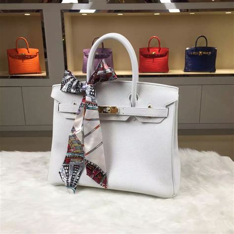 hermes white woeven handbag rolled leather handle tassels|hermes leather accessories.